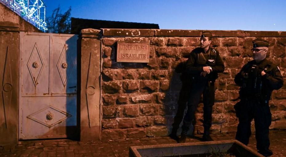 Sixty-seven old or more recent gravestones were vandalised with swastikas in pink, white and silver - Avaz