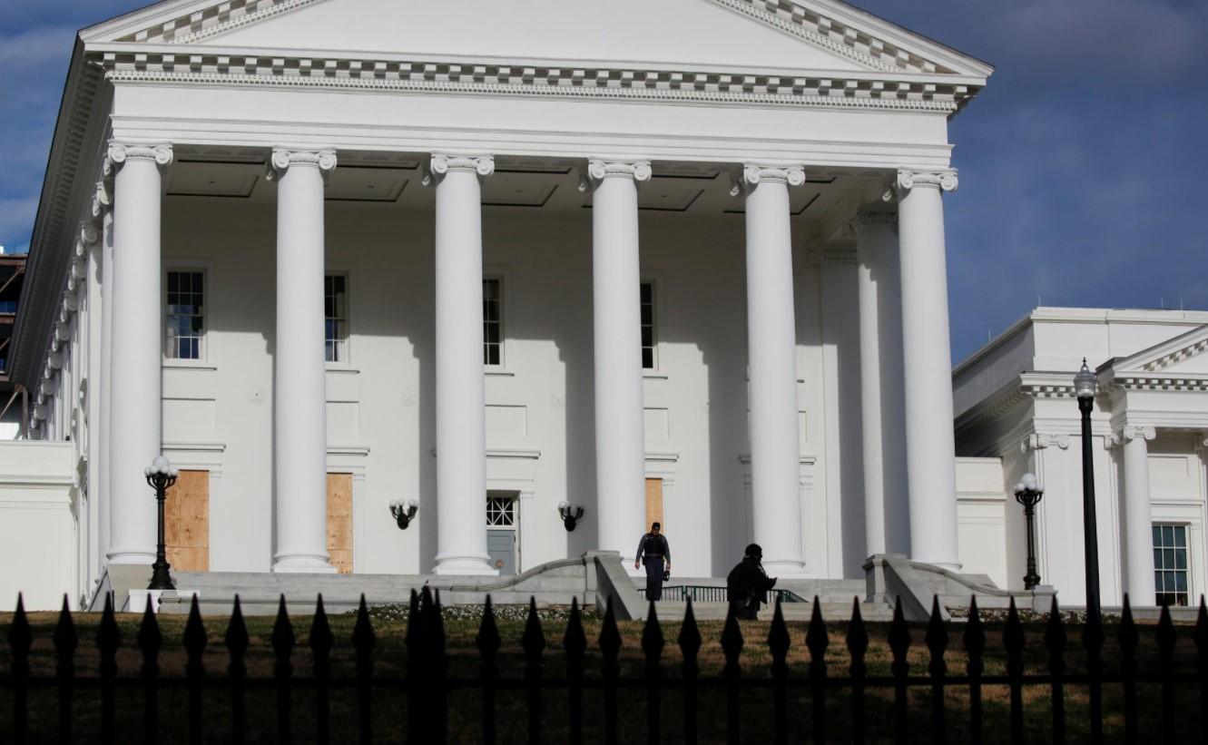 Law enforcement officers patrol on the grounds of Virginia State Capitol, days ahead of President-elect Joe Biden inauguration, in Richmond, Virginia, U.S. January 17, 2021. - Avaz