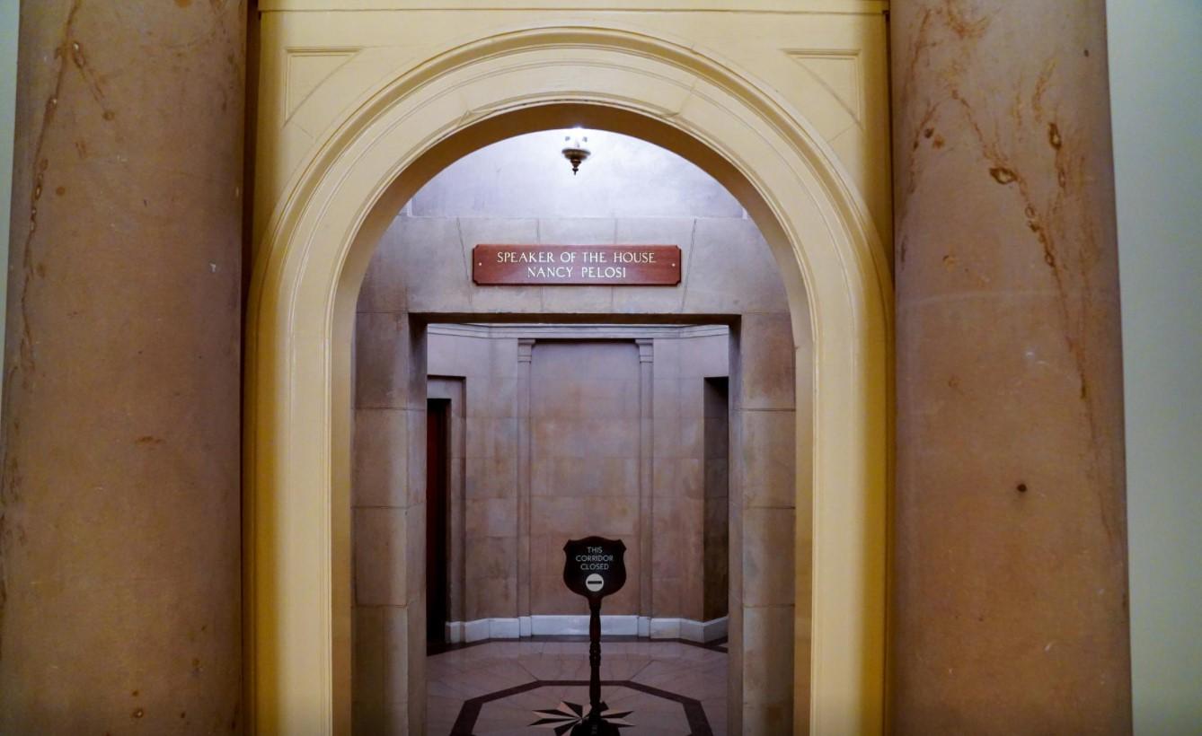 U.S. House Speaker Nancy Pelosi's office placard is replaced above her office after rioters vandalized it while storming the Capitol in Washington, U.S., January 17, 2021. - Avaz