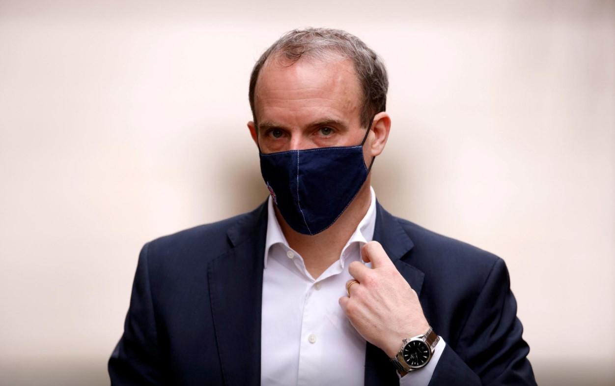 Britain's Foreign Affairs Secretary Dominic Raab walks outside Downing Street in London, Britain, February 3, 2021. - Avaz