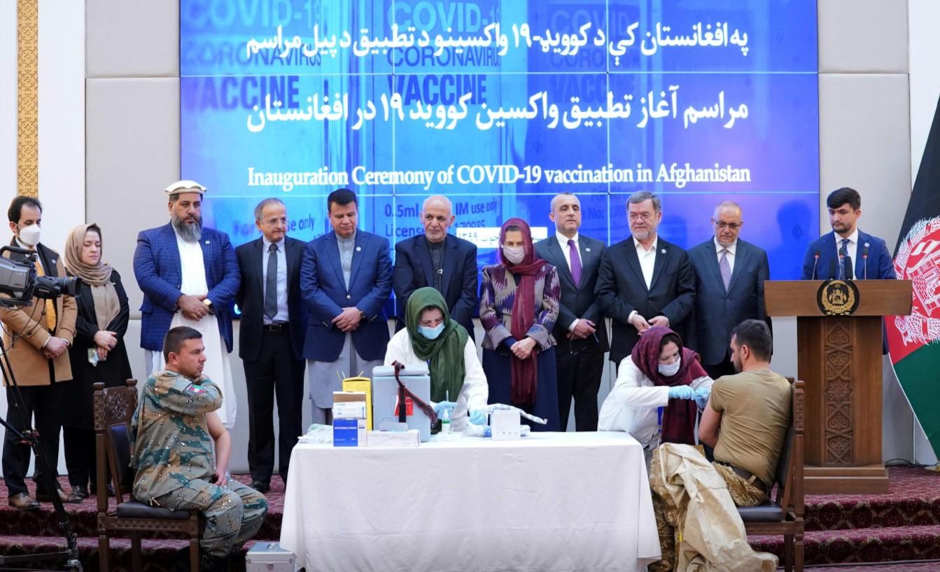 Members of Afghan security forces receive the first dose of AstraZeneca's COVID-19 vaccine from India, during a ceremony at the presidential palace in Kabul, Afghanistan February 23, 2021. - Avaz