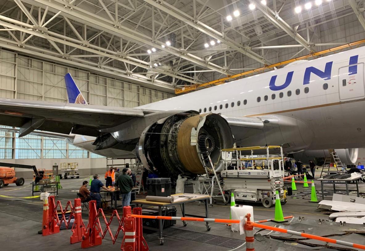 The damaged starboard engine of United Airlines flight 328, a Boeing 777-200, is seen following a Feb. 20 engine failure incident, in a hangar at Denver International Airport in Denver, Colorado, U.S. February 22, 2021. - Avaz