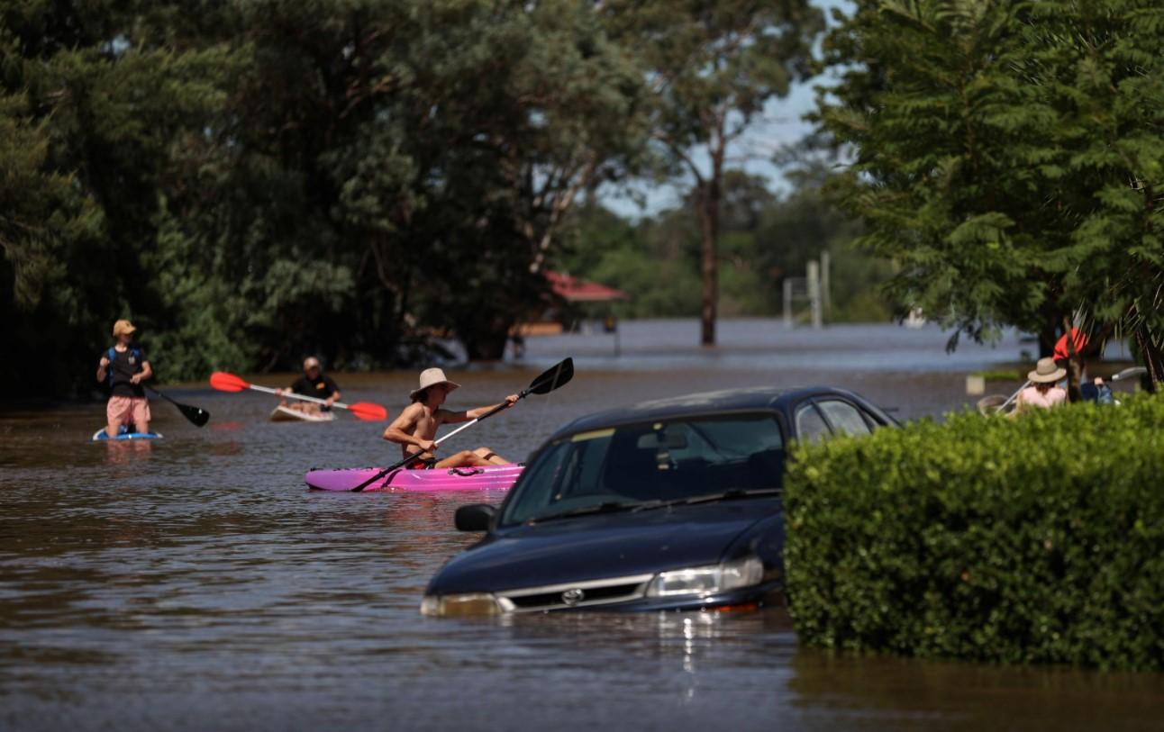 Australian floods kill two, more evacuations as clean-up begins