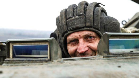 A Ukrainian soldier looks out of an APC during combat training in Zaporizhzhia region, Ukraine, Tuesday, Jan. 24, 2023. - Avaz