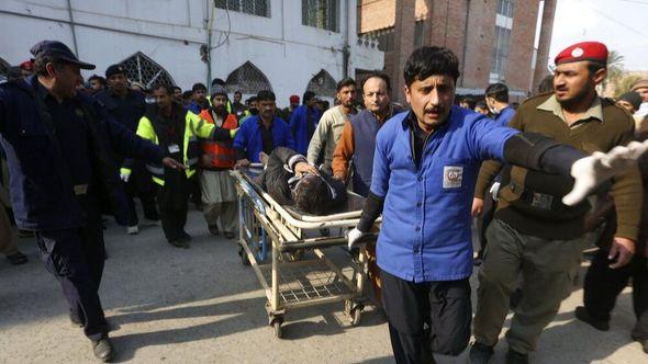 An ambulance carries wounded people toward a hospital from a bomb explosion site in Peshawar, Pakistan, Monday, Jan. 30, 2023 - Avaz