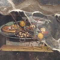 That's no pizza: A wall painting found in Pompeii doesn't depict Italy's iconic dish